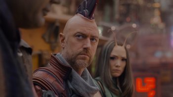 Movie still from “The Guardians of the Galaxy Holiday Special” (2022), directed by James Gunn – A man and a woman wearing costumes and headpieces; Close Up shot, Over the shoulder angle