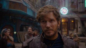 Movie still from “The Guardians of the Galaxy Holiday Special” (2022), directed by James Gunn – A person wearing a leather jacket; Close Up shot, Over the shoulder angle