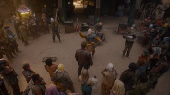 Movie still from “The Guardians of the Galaxy Holiday Special” (2022), directed by James Gunn – A group of people standing around in a circle; Wide shot, High angle