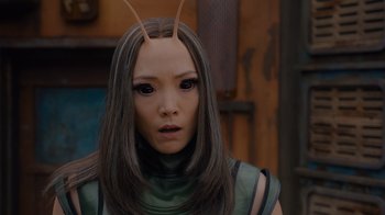 Movie still from “The Guardians of the Galaxy Holiday Special” (2022), directed by James Gunn – A person wearing a costume with horns; Close Up shot, Over the shoulder angle