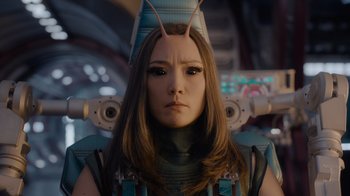 Movie still from “The Guardians of the Galaxy Holiday Special” (2022), directed by James Gunn – A woman in a space suit with a helmet on her head; Close Up shot, Over the shoulder angle