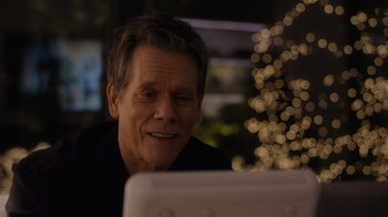 Movie still from “The Guardians of the Galaxy Holiday Special” (2022), directed by James Gunn – A man sitting in front of a computer screen; Close Up shot, Over the shoulder angle