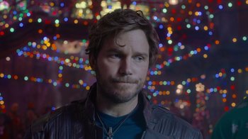 Movie still from “The Guardians of the Galaxy Holiday Special” (2022), directed by James Gunn – A person wearing a leather jacket; Close Up shot, Over the shoulder angle