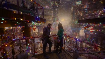 Movie still from “The Guardians of the Galaxy Holiday Special” (2022), directed by James Gunn – A man and a woman standing on a bridge; Extreme Wide shot, Over the shoulder angle