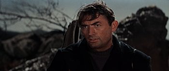 Movie still from “The Guns of Navarone” (1961), directed by J. Lee Thompson – A person wearing a jacket; Close Up shot, Low angle