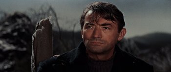 Movie still from “The Guns of Navarone” (1961), directed by J. Lee Thompson – A person wearing a jacket; Close Up shot, Low angle