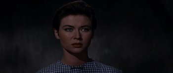 Movie still from “The Guns of Navarone” (1961), directed by J. Lee Thompson – A person wearing a plaid shirt; Close Up shot, Low angle