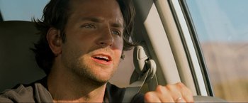 Movie still from “The Hangover Part III” (2013), directed by Todd Phillips – A person talking on a cell phone; Close Up shot, Over the shoulder angle