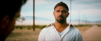 Movie still from “The Hangover Part III” (2013), directed by Todd Phillips – A person wearing a hat; Close Up shot, Low angle