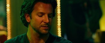 Movie still from “The Hangover Part III” (2013), directed by Todd Phillips – A person with his eyes closed; Close Up shot, Low angle