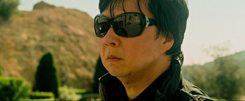Movie still from “The Hangover Part III” (2013), directed by Todd Phillips – A person wearing sunglasses; Close Up shot, Low angle