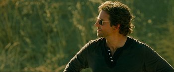Movie still from “The Hangover Part III” (2013), directed by Todd Phillips – A person wearing sunglasses; Close Up shot, Over the shoulder angle