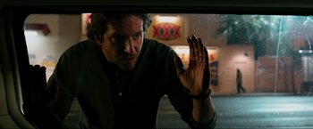 Movie still from “The Hangover Part III” (2013), directed by Todd Phillips – A person looking out a car window; Close Up shot, Over the shoulder angle