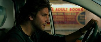 Movie still from “The Hangover Part III” (2013), directed by Todd Phillips – A person in a car; Close Up shot, Over the shoulder angle