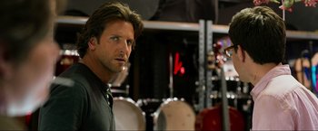 Movie still from “The Hangover Part III” (2013), directed by Todd Phillips – A person in a room with drums; Close Up shot, Over the shoulder angle