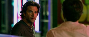 Movie still from “The Hangover Part III” (2013), directed by Todd Phillips – A person sitting in front of another person; Close Up shot, Over the shoulder angle