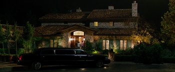 Movie still from “The Hangover Part III” (2013), directed by Todd Phillips – A black limousine parked in front of a house; Extreme Wide shot, High angle