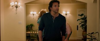 Movie still from “The Hangover Part III” (2013), directed by Todd Phillips – A man standing in front of a mirror in a room; Medium shot, Over the shoulder angle