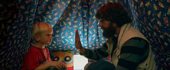 Movie still from “The Hangover Part III” (2013), directed by Todd Phillips – A man and a woman sitting in front of each other; Medium shot, Over the shoulder angle