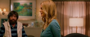 Movie still from “The Hangover Part III” (2013), directed by Todd Phillips – A woman with long blonde hair standing in front of a window; Medium shot, Over the shoulder angle