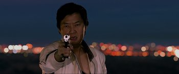 Movie still from “The Hangover Part III” (2013), directed by Todd Phillips – A man holding a gun in his hand; Close Up shot, Low angle