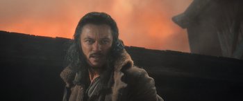 Movie still from “The Hobbit: The Battle of the Five Armies” (2014), directed by Peter Jackson – A person wearing a fur coat; Close Up shot, Low angle