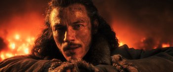 Movie still from “The Hobbit: The Battle of the Five Armies” (2014), directed by Peter Jackson – A person with a beard; Close Up shot, Low angle