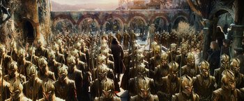 Movie still from “The Hobbit: The Battle of the Five Armies” (2014), directed by Peter Jackson – A large group of people in the middle of a city; Extreme Wide shot, High angle