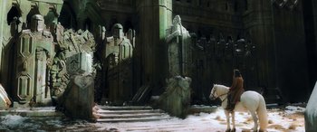 Movie still from “The Hobbit: The Battle of the Five Armies” (2014), directed by Peter Jackson – A statue of a man and a horse in a building; Extreme Wide shot, Low angle