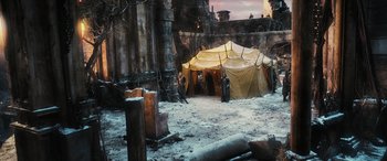 Movie still from “The Hobbit: The Battle of the Five Armies” (2014), directed by Peter Jackson – A tent in the middle of an outdoor setting; Extreme Wide shot, High angle