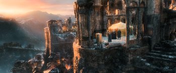Movie still from “The Hobbit: The Battle of the Five Armies” (2014), directed by Peter Jackson – A group of people standing on top of a building; Extreme Wide shot, High angle