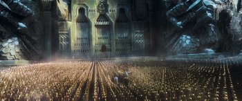 Movie still from “The Hobbit: The Battle of the Five Armies” (2014), directed by Peter Jackson – A group of people standing in the middle of a field; Extreme Wide shot, High angle