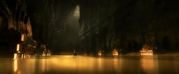 Movie still from “The Hobbit: The Battle of the Five Armies” (2014), directed by Peter Jackson – A man riding a boat on a body of water near a building; Extreme Wide shot, High angle