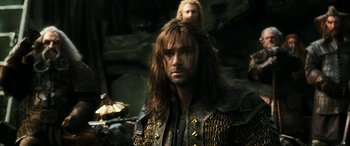 Movie still from “The Hobbit: The Battle of the Five Armies” (2014), directed by Peter Jackson – A person with long hair; Close Up shot, Over the shoulder angle