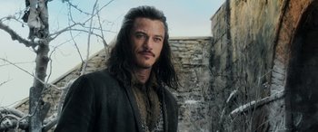 Movie still from “The Hobbit: The Battle of the Five Armies” (2014), directed by Peter Jackson – A person with long hair; Close Up shot, Over the shoulder angle