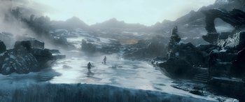 Movie still from “The Hobbit: The Battle of the Five Armies” (2014), directed by Peter Jackson – Two people standing in the middle of a frozen lake; Extreme Wide shot, High angle