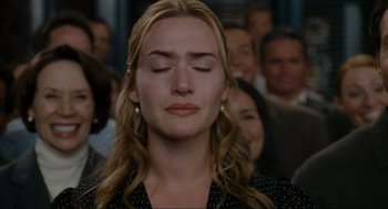 Movie still from “The Holiday” (2006), directed by Nancy Meyers – A person with her eyes closed; Close Up shot, High angle