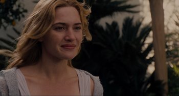 Movie still from “The Holiday” (2006), directed by Nancy Meyers – A person with blonde hair; Close Up shot, Over the shoulder angle