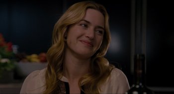 Movie still from “The Holiday” (2006), directed by Nancy Meyers – A person with long blonde hair; Close Up shot, Over the shoulder angle
