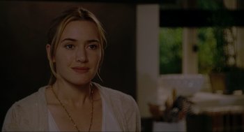 Movie still from “The Holiday” (2006), directed by Nancy Meyers – A person wearing a white shirt; Close Up shot, Over the shoulder angle