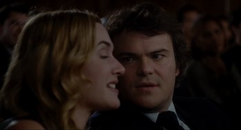 Movie still from “The Holiday” (2006), directed by Nancy Meyers – A man and a woman looking at one another; Close Up shot, Over the shoulder angle