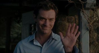 Movie still from “The Holiday” (2006), directed by Nancy Meyers – A person with a hand wave; Close Up shot, Over the shoulder angle