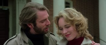 Movie still from “The House by the Cemetery” (1981), directed by Lucio Fulci – A man and a woman looking at one another; Close Up shot, Over the shoulder angle