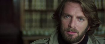 Movie still from “The House by the Cemetery” (1981), directed by Lucio Fulci – A person with a beard; Close Up shot, Low angle