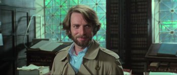 Movie still from “The House by the Cemetery” (1981), directed by Lucio Fulci – A person wearing a jacket; Close Up shot, Low angle