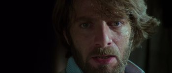 Movie still from “The House by the Cemetery” (1981), directed by Lucio Fulci – A person with a beard; Close Up shot, Low angle