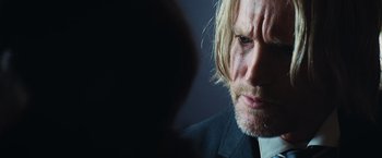 Movie still from “The Hunger Games” (2012), directed by Gary Ross – A person with long hair; Close Up shot, Over the shoulder angle