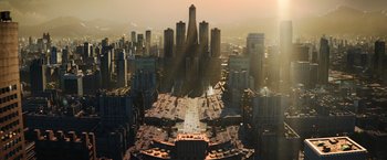 Movie still from “The Hunger Games: Catching Fire” (2013), directed by Francis Lawrence – An aerial view of a large city with many skyscrapers; Extreme Wide shot, Overhead angle