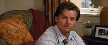 Movie still from “Diary of a Wimpy Kid: Dog Days” (2012), directed by David Bowers – A person wearing a shirt and a tie; Close Up shot, Over the shoulder angle