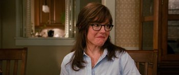 Movie still from “Diary of a Wimpy Kid: Dog Days” (2012), directed by David Bowers – A woman wearing glasses and a button down shirt; Close Up shot, Over the shoulder angle